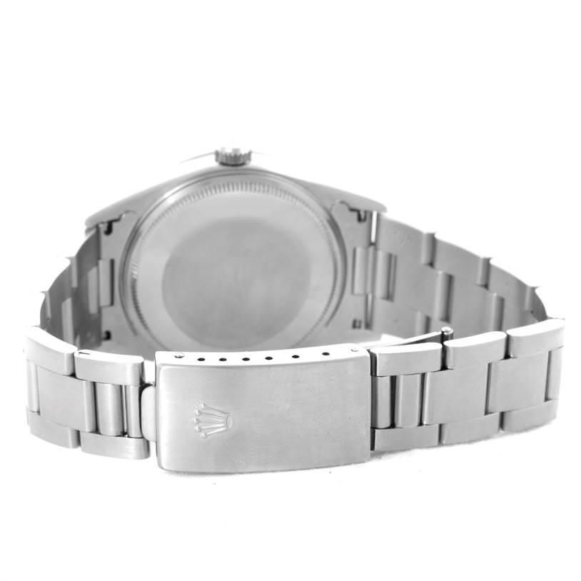 The image shows the back view of a Rolex Air-King 14000 Men's Stainless Steel Blue Dial 14000 Men's Stainless Steel Blue Dial watch, highlighting the case back and part of the bracelet with the clasp.