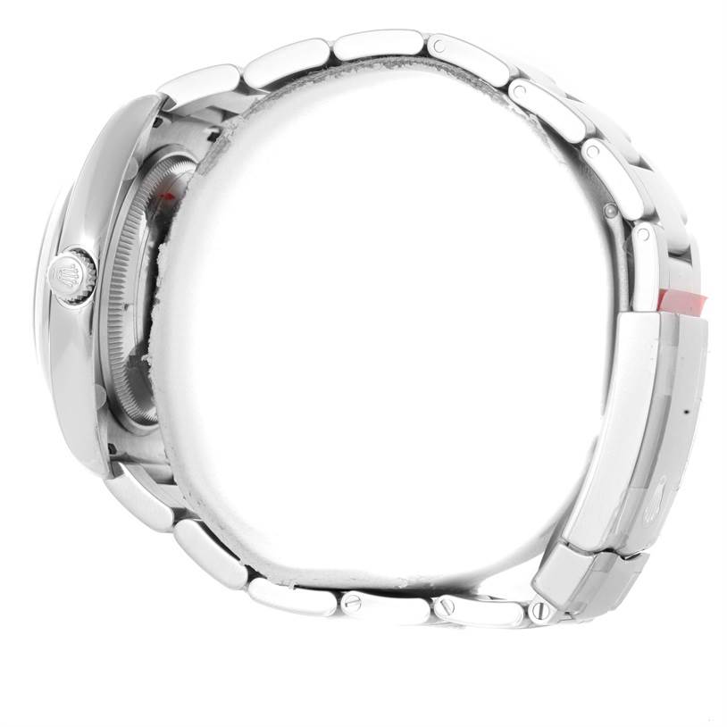 This side profile image of the Rolex Air-King 114200 Men's Stainless Steel Blue Dial 114200 Men's Stainless Steel Blue Dial watch shows the crown, case, and bracelet.