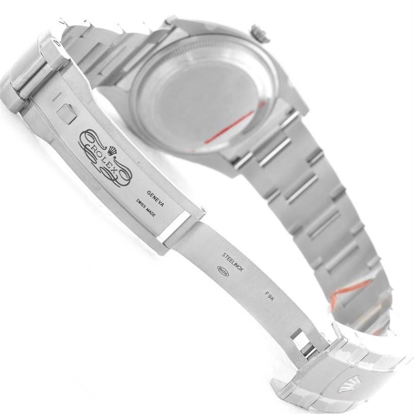 The image shows the open clasp and part of the bracelet of a Rolex Air-King 114200 Men's Stainless Steel Blue Dial 114200 Men's Stainless Steel Blue Dial watch from a side angle.