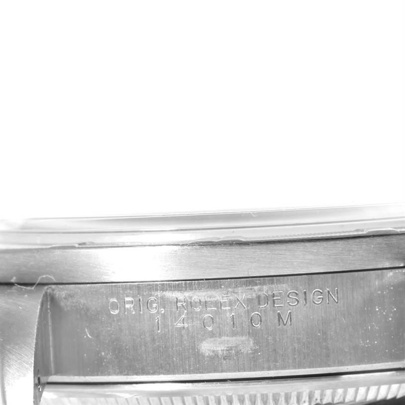 This image shows a close-up view of the side of a Rolex Air-King 14010 Stainless Steel Blue Dial 14010 Stainless Steel Blue Dial watch, highlighting the engraved serial and model number.