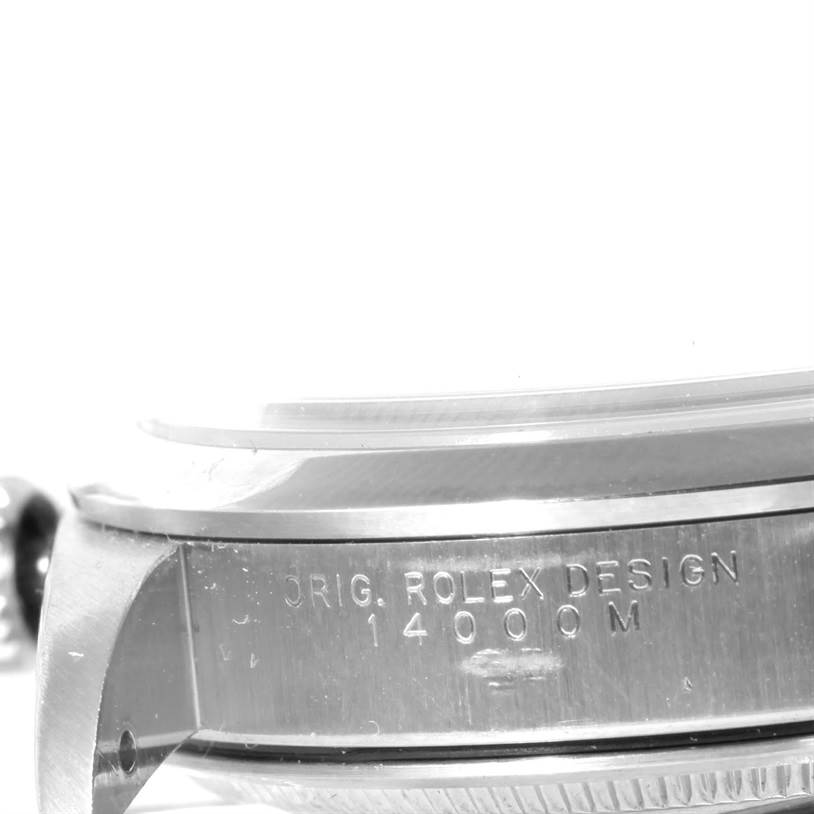 This close-up image shows the engraved side case of a Rolex Air-King 14000 Men's Stainless Steel Black Dial 14000 Men's Stainless Steel Black Dial model, displaying the "ORIG. ROLEX DESIGN 14000M" inscription.