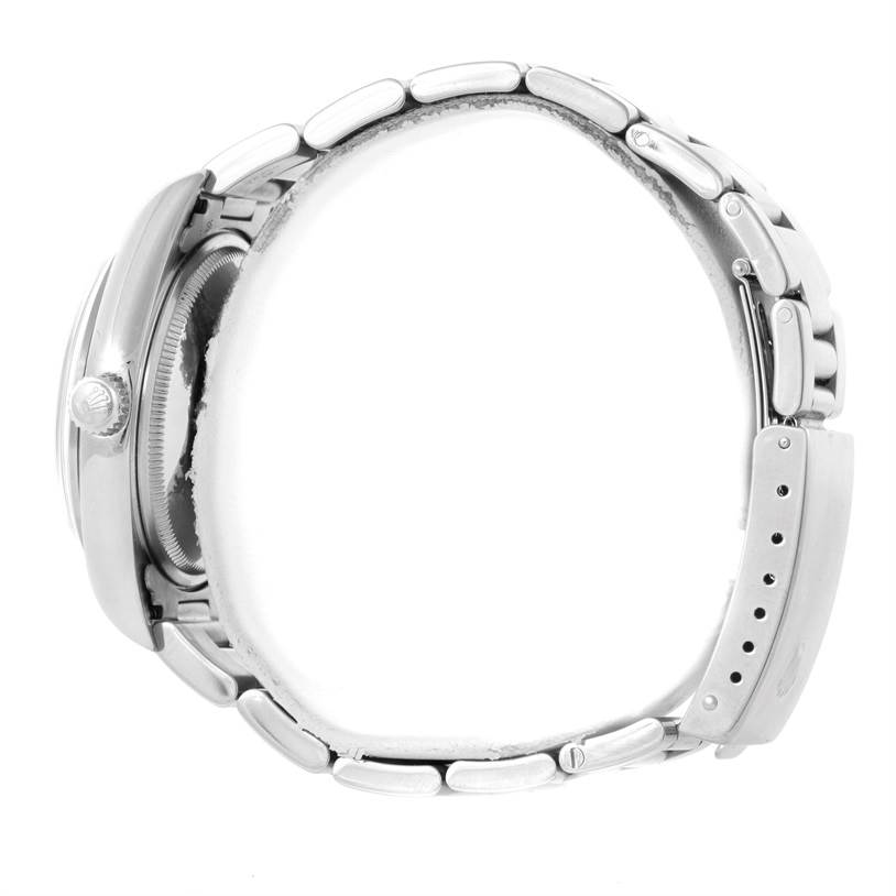 This image shows the side view of a Rolex Air-King 14000 Men's Stainless Steel Black Dial 14000 Men's Stainless Steel Black Dial watch, emphasizing its case, crown, and metal bracelet.