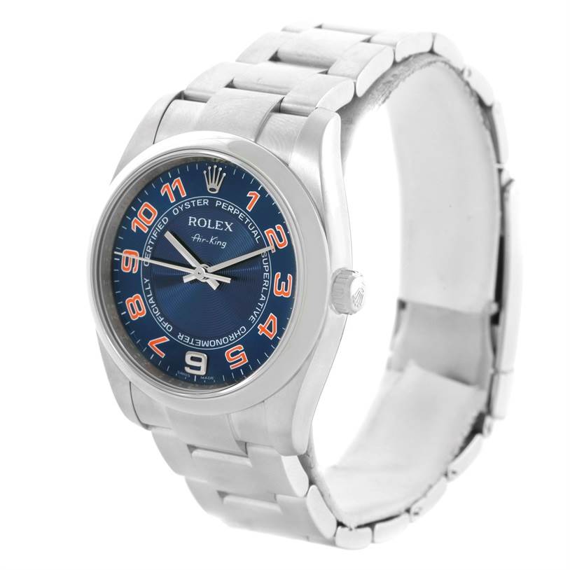 The Rolex Air-King 114200 Men
s Stainless Steel Blue Dial 114200 Men
s Stainless Steel Blue Dial watch is shown from a front-left angle, displaying the face, crown, and bracelet.