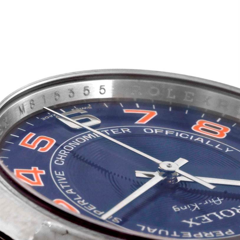 This close-up image of the Rolex Air-King 114200 Men
s Stainless Steel Blue Dial 114200 Men
s Stainless Steel Blue Dial watch shows the bezel, part of the dial, and the hands, highlighting the model details.