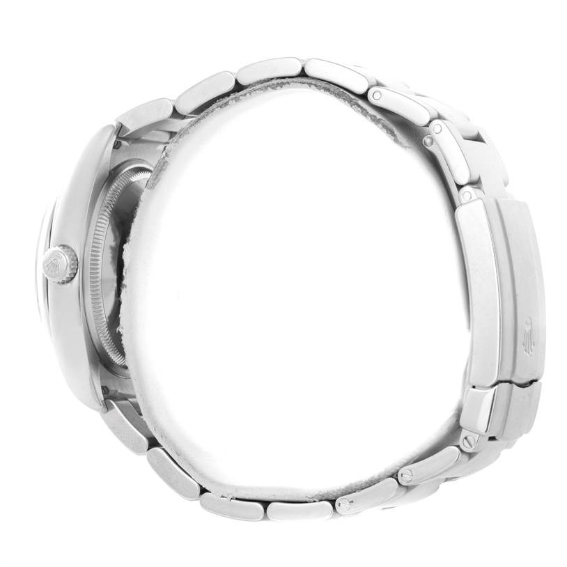 This image shows a side view of a Rolex Air-King 114200 Men
s Stainless Steel Blue Dial 114200 Men
s Stainless Steel Blue Dial watch focusing on the bracelet and clasp.