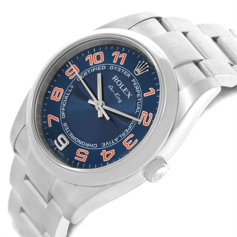 The Rolex Air-King 114200 Men
s Stainless Steel Blue Dial 114200 Men
s Stainless Steel Blue Dial watch is shown in a slight side angle, highlighting the blue dial, crown, and part of the bracelet.