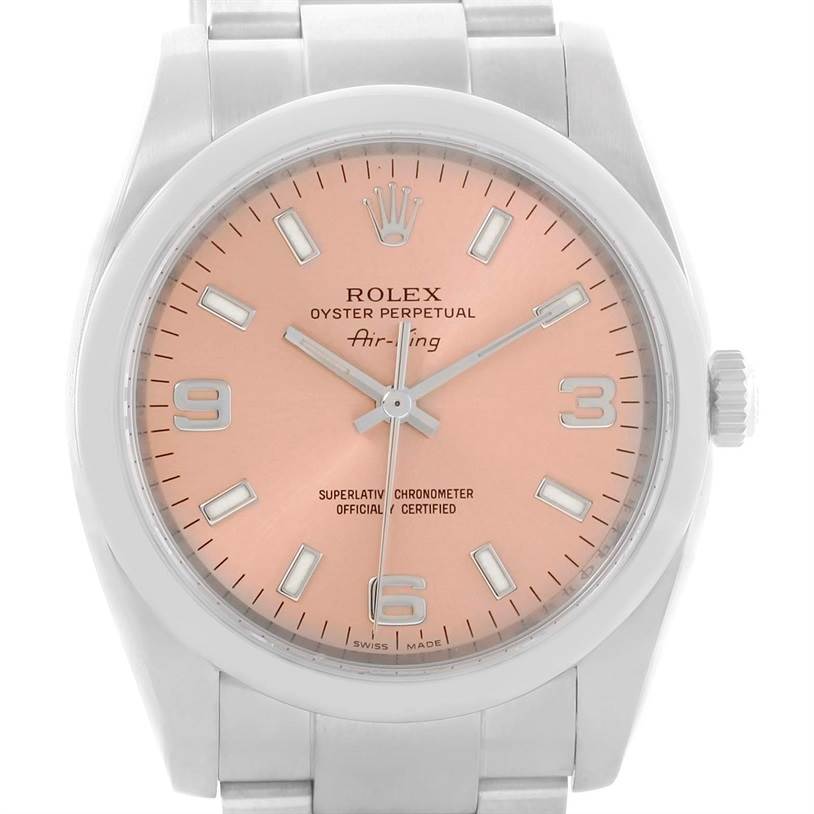 The image shows a close-up frontal view of the Rolex Air-King 114200 Men's Stainless Steel Pink Dial 114200 Men's Stainless Steel Pink Dial watch, highlighting its dial, hands, and crown.