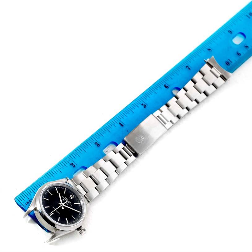 The image shows a Rolex Air-King 14000 Men's Stainless Steel Black Dial 14000 Men's Stainless Steel Black Dial watch laid flat, measured with a blue ruler, displaying the dial, bracelet, and clasp.