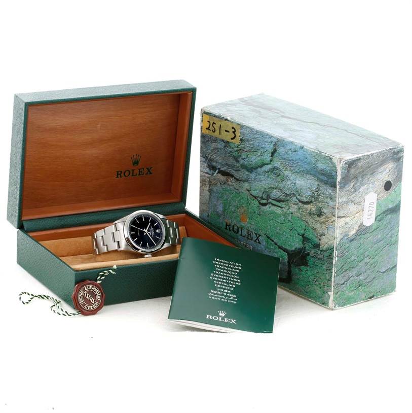 The image shows a Rolex Air-King 14000 Men's Stainless Steel Black Dial 14000 Men's Stainless Steel Black Dial watch in its open box with accompanying paperwork and the outer box visible in the background.