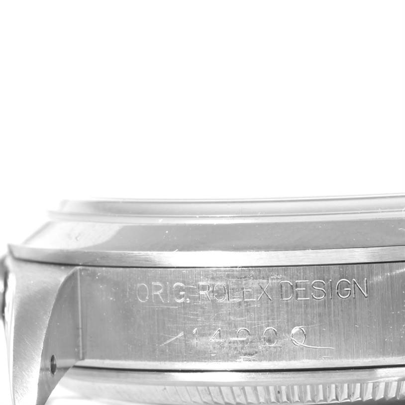 This is a side view of the Rolex Air-King 14000 Men's Stainless Steel Black Dial 14000 Men's Stainless Steel Black Dial, showcasing the case with "ORIG. ROLEX DESIGN" engraving and model number 14000.