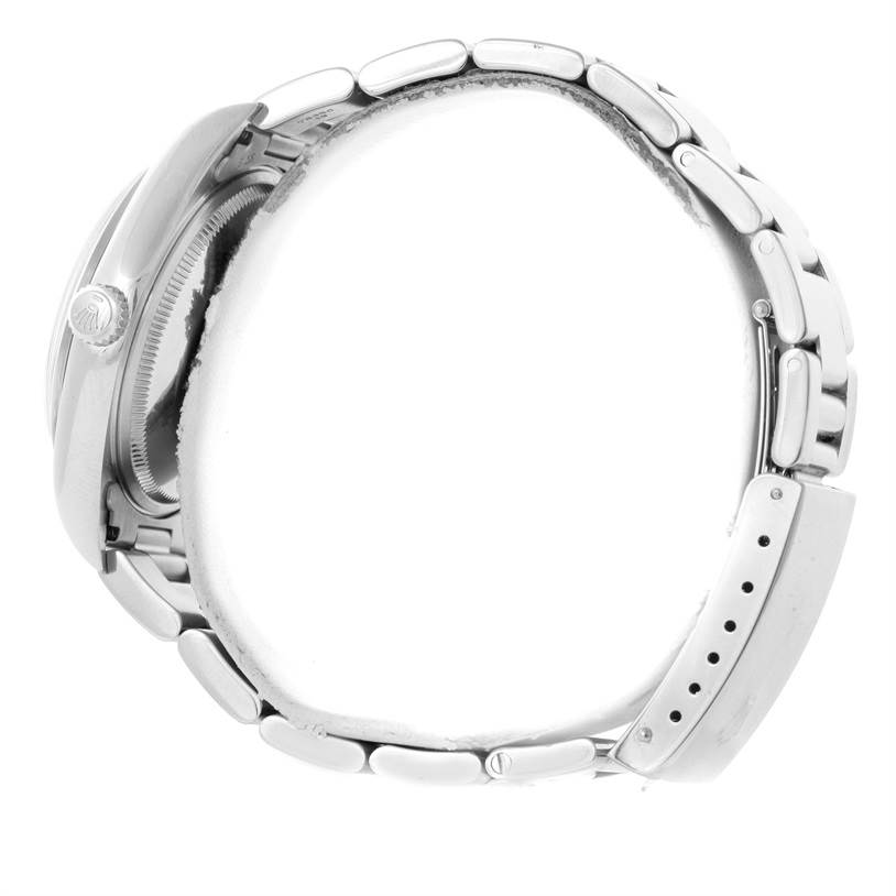 The image shows a side view of a Rolex Air-King 14000 Men's Stainless Steel Pink Dial 14000 Men's Stainless Steel Pink Dial watch, highlighting its metal bracelet and crown.