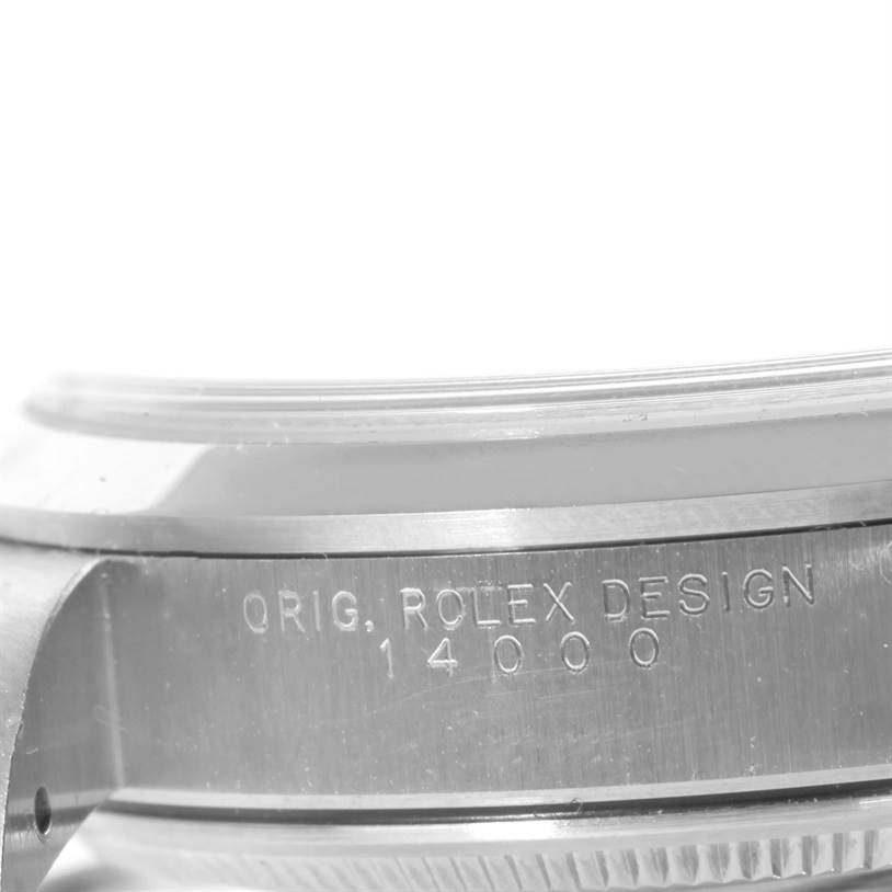 This close-up image shows the side of a Rolex Air-King 14000 Men's Stainless Steel Pink Dial 14000 Men's Stainless Steel Pink Dial watch highlighting the "ORIG. ROLEX DESIGN" and model number "14000" engraving.