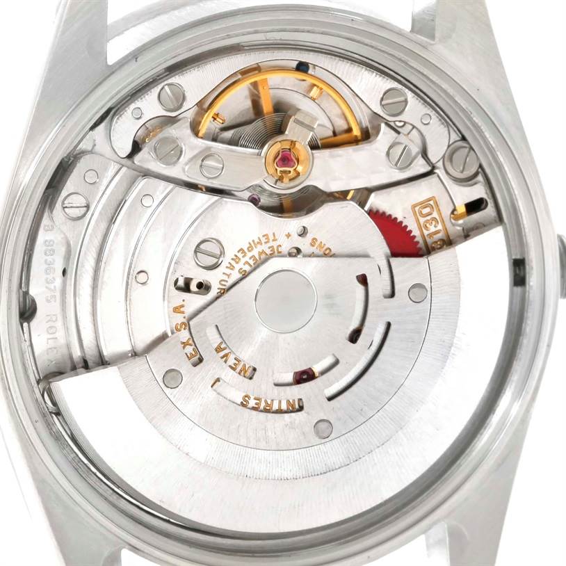 The image shows the back view of a Rolex Air-King 14010 Men's Stainless Steel Blue Dial 14010 Men's Stainless Steel Blue Dial, featuring its exposed mechanical movement.