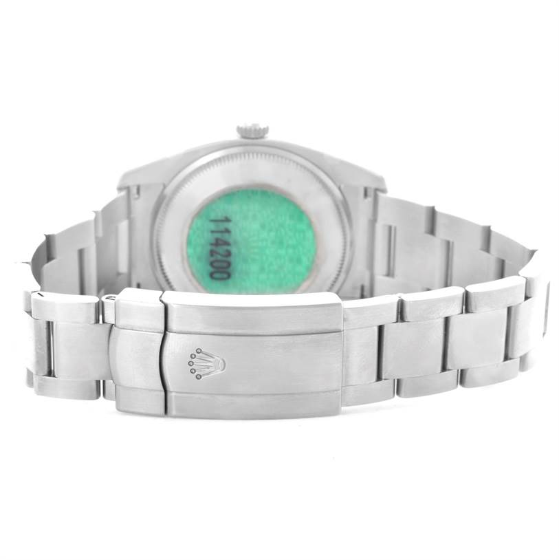 The image shows the back side of a Rolex Air-King 114200 Men's Stainless Steel White Dial 114200 Men's Stainless Steel White Dial watch, highlighting the clasp and case back.