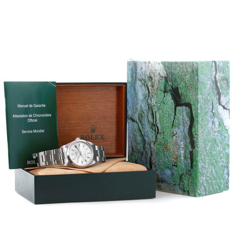 The image shows a Rolex Air-King 14000 Men's Stainless Steel Silver Dial 14000 Men's Stainless Steel Silver Dial watch displayed in an open box with documentation and packaging visible.