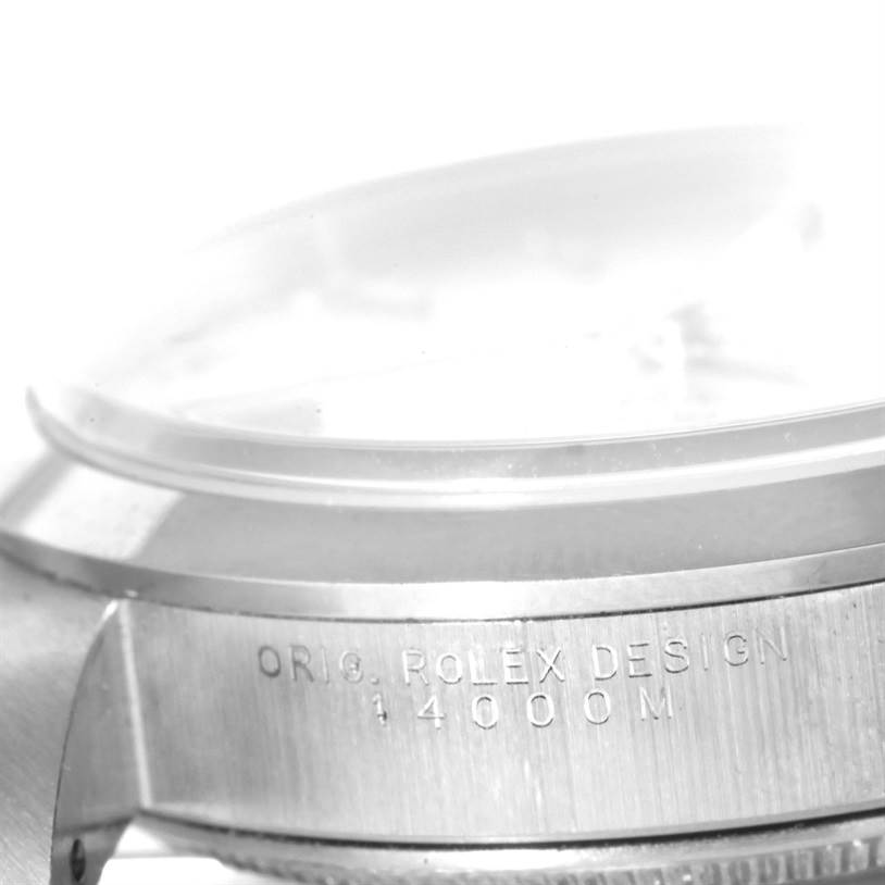 Close-up of the Rolex Air-King 14000 Men's Stainless Steel Silver Dial 14000 Men's Stainless Steel Silver Dial watch showing the side of the case and engraving with model number 14000M.