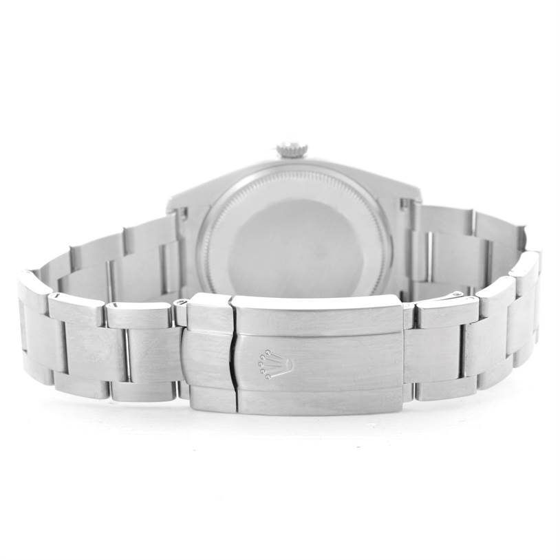 The image shows the back case and bracelet clasp of a Rolex Air-King 114200 Men's Stainless Steel Blue Dial 114200 Men's Stainless Steel Blue Dial watch from a rear angle.