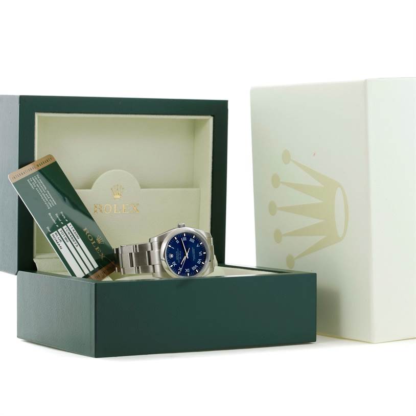The image shows a Rolex Air-King 114200 Men's Stainless Steel Blue Dial 114200 Men's Stainless Steel Blue Dial watch, box, and warranty card, photographed from a front angle.