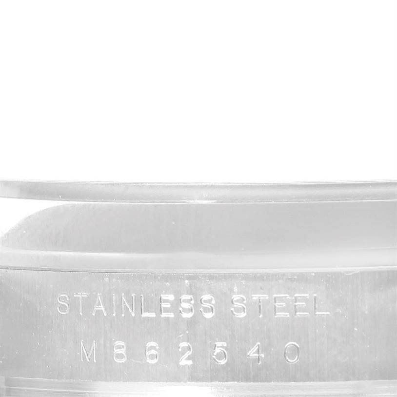 This is a close-up angle of the Rolex Air-King 114200 Men's Stainless Steel Blue Dial 114200 Men's Stainless Steel Blue Dial's stainless steel casing showing the serial number.