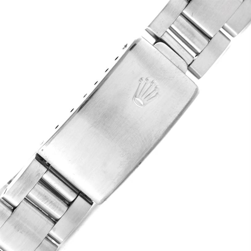 This image shows a close-up of the clasp and part of the bracelet of a Rolex Air-King 14010 Stainless Steel Pink Dial 14010 Stainless Steel Pink Dial watch.