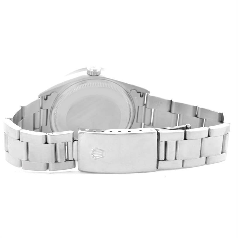 The image shows the back side and clasp of the Rolex Air-King 14010 Stainless Steel Pink Dial 14010 Stainless Steel Pink Dial watch at a horizontal angle.