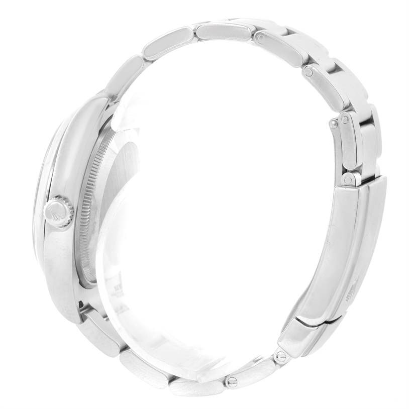 This image shows a side view of the Rolex Air-King 114200 Men's Stainless Steel Silver Dial 114200 Men's Stainless Steel Silver Dial watch, highlighting its crown, case, and bracelet.