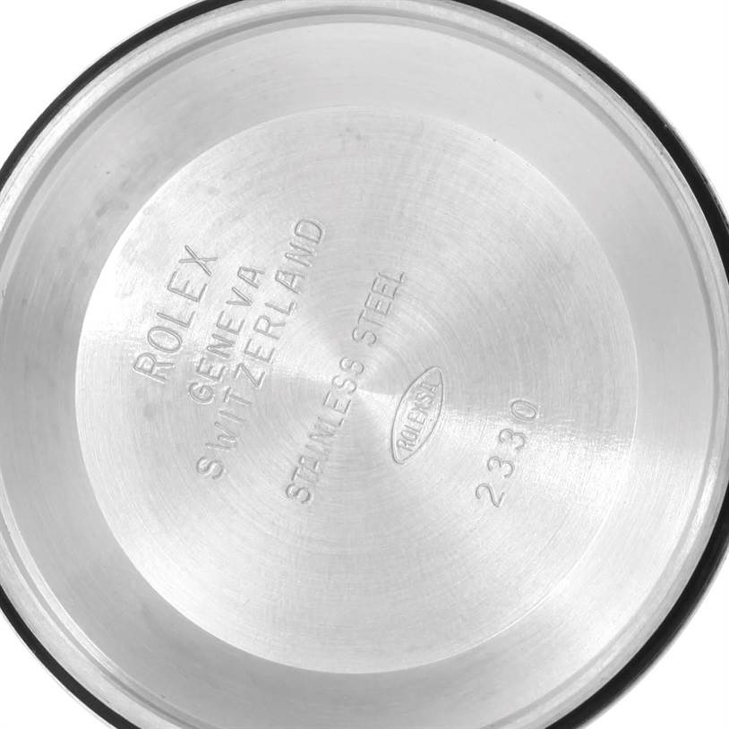 This is an interior view of the case back of a Rolex Air-King 114200 Men's Stainless Steel Silver Dial 114200 Men's Stainless Steel Silver Dial watch, showing the engraved model details.