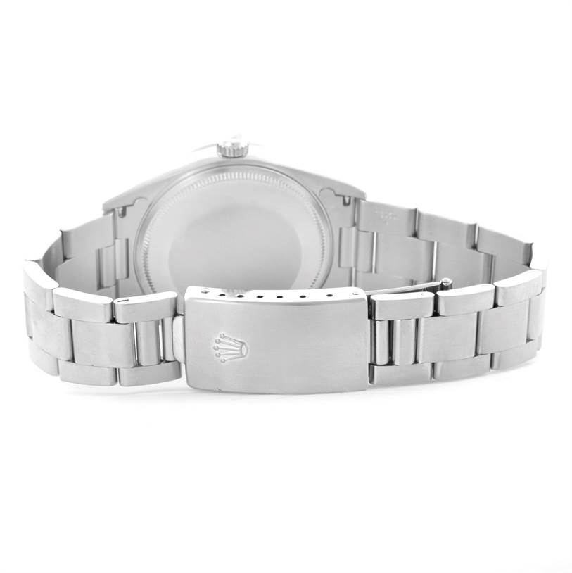 The image shows the back of a Rolex Air-King 14000 Men's Stainless Steel Blue Dial 14000 Men's Stainless Steel Blue Dial watch, including the case back and the bracelet with a clasp.