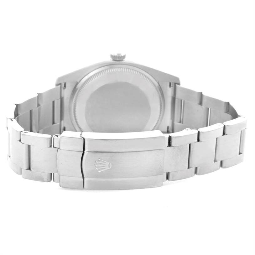 This image shows the back and clasp of a Rolex Air-King 114200 Men's Stainless Steel Blue Dial 114200 Men's Stainless Steel Blue Dial watch at an angle highlighting the bracelet and case back.