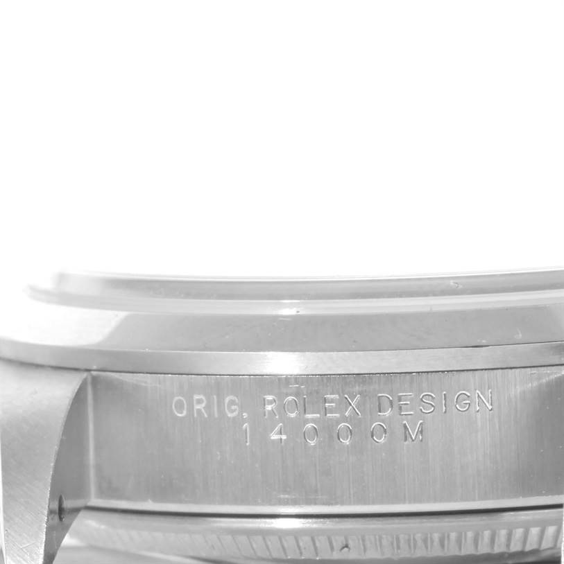 The image shows a side view of the outer casing of a Rolex Air-King 14000 Men's Stainless Steel White Dial 14000 Men's Stainless Steel White Dial watch, featuring engraved text with model details.