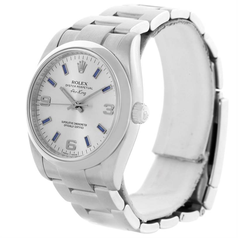 The Rolex Air-King 114200 Men's Stainless Steel Silver Dial 114200 Men's Stainless Steel Silver Dial watch is shown at a slight angle, highlighting its face, crown, and part of the bracelet.