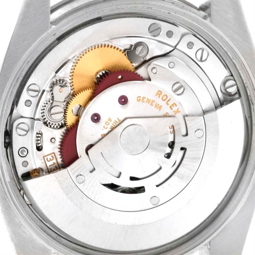This image shows the internal mechanism of a Rolex Air-King 114200 Men's Stainless Steel Silver Dial 114200 Men's Stainless Steel Silver Dial watch, viewed from the back case.