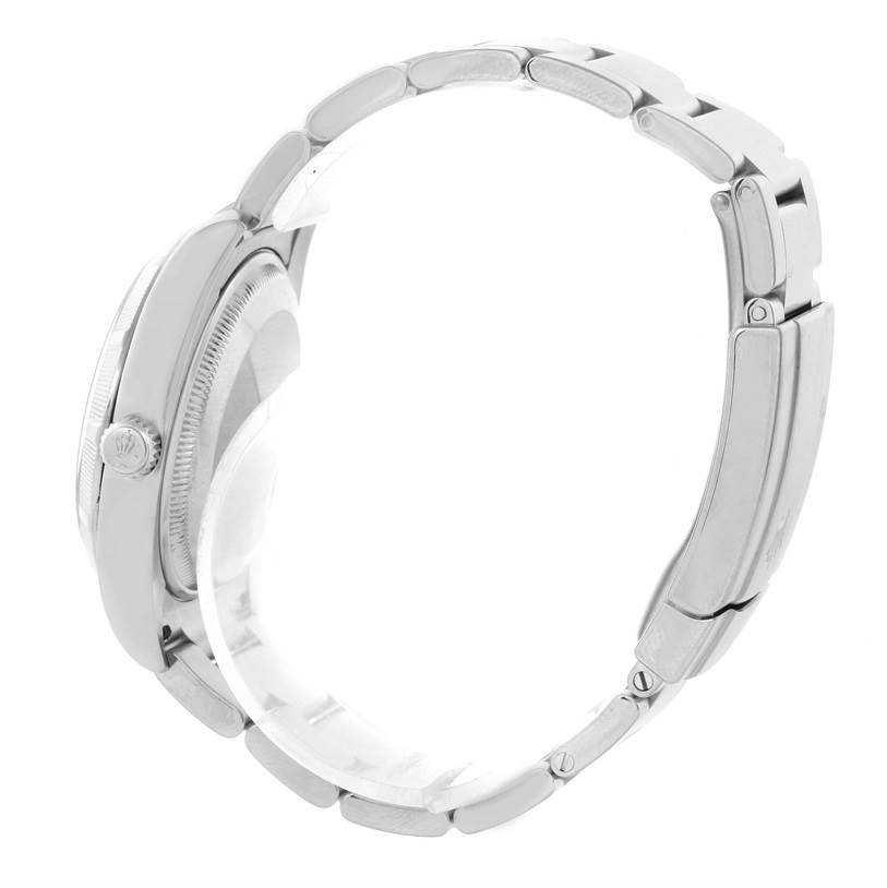 The image shows a side view of a Rolex Air-King 114210 Men's Stainless Steel Silver Dial 114210 Men's Stainless Steel Silver Dial watch, highlighting the crown, case, and metal bracelet.