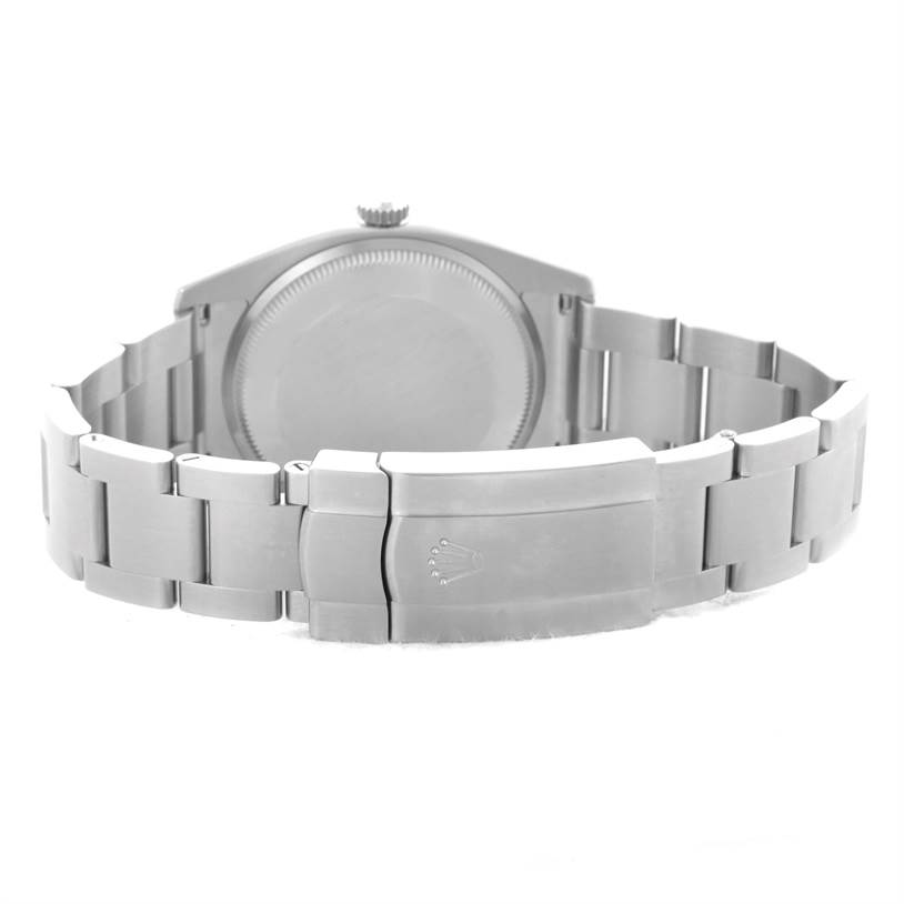 This image shows the back view of a Rolex Air-King 114200 Men's Stainless Steel Silver Dial 114200 Men's Stainless Steel Silver Dial watch, highlighting the clasp, bracelet, and case back.