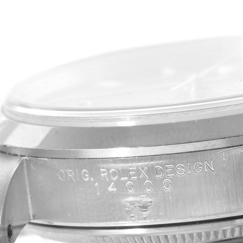 The image shows a close-up side view of a Rolex Air-King 14000 Men's Stainless Steel Pink Dial 14000 Men's Stainless Steel Pink Dial watch, highlighting the case with "ORIG.ROLEX DESIGN 14000" engraving.