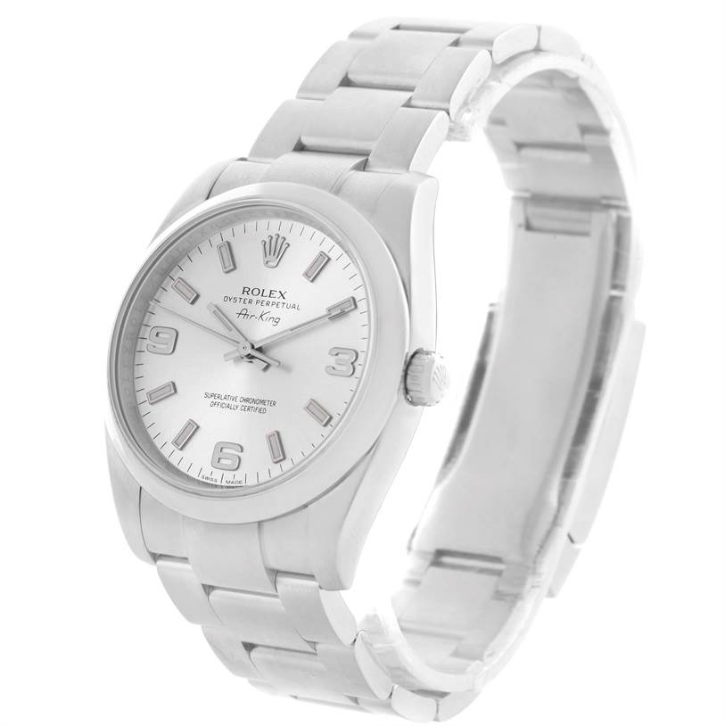 The image shows a side angle of the Rolex Air-King 114200SASO Men's Stainless Steel Silver Dial 114200SASO Men's Stainless Steel Silver Dial watch, highlighting the dial, bracelet, and crown.