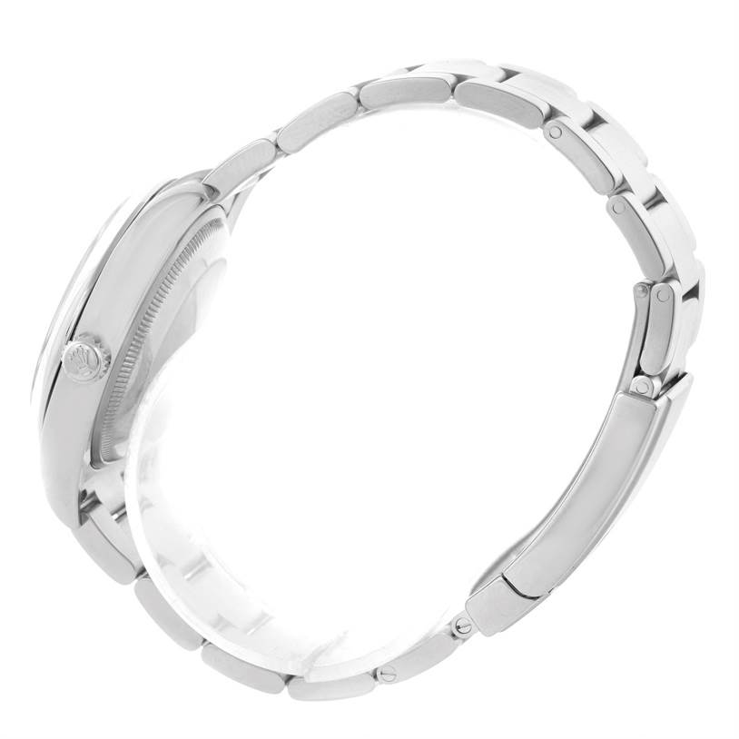 This image shows a side view of a Rolex Air-King 114200SASO Men's Stainless Steel Silver Dial 114200SASO Men's Stainless Steel Silver Dial watch, highlighting its case and bracelet.