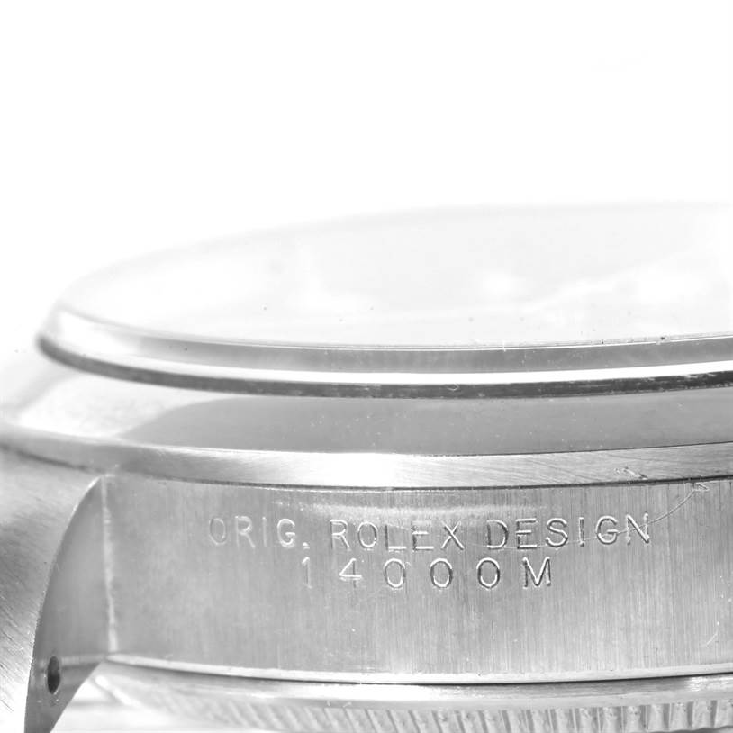 The image shows a close-up of the side of the Rolex Air-King 14000 Men's Stainless Steel Blue Dial 14000 Men's Stainless Steel Blue Dial watch case, featuring the engraving and part of the crystal.