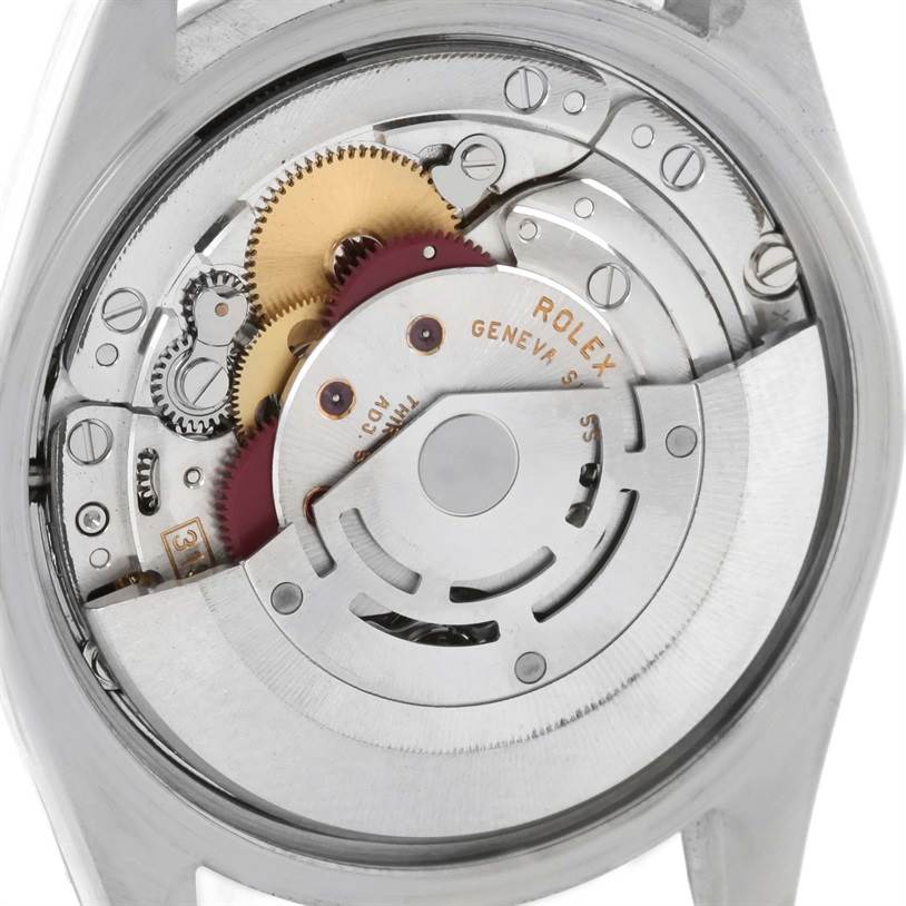 This image shows the inner mechanical movement of a Rolex Air-King 14000 Men's Stainless Steel Blue Dial 14000 Men's Stainless Steel Blue Dial watch with visible gears and components.