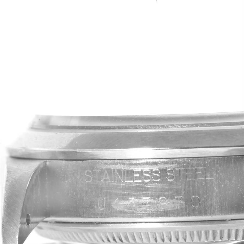 The image shows a close-up side view of the case of a Rolex Air-King 14000 Men's Stainless Steel Black Dial 14000 Men's Stainless Steel Black Dial watch, highlighting the stainless steel material and part of the bezel.