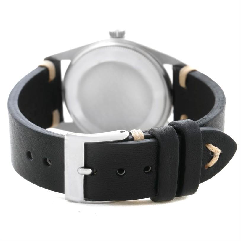 The image shows the back of a Rolex Air-King 14000 Men's Stainless Steel Black Dial 14000 Men's Stainless Steel Black Dial watch, highlighting its leather strap and buckle.