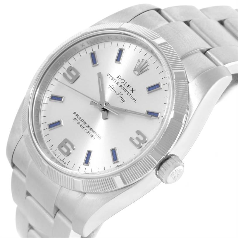 The image shows a Rolex Air-King 114210 Men's Stainless Steel Silver Dial 114210 Men's Stainless Steel Silver Dial watch at a slight angle, highlighting its silver dial, numerals, bezel, and stainless steel bracelet.