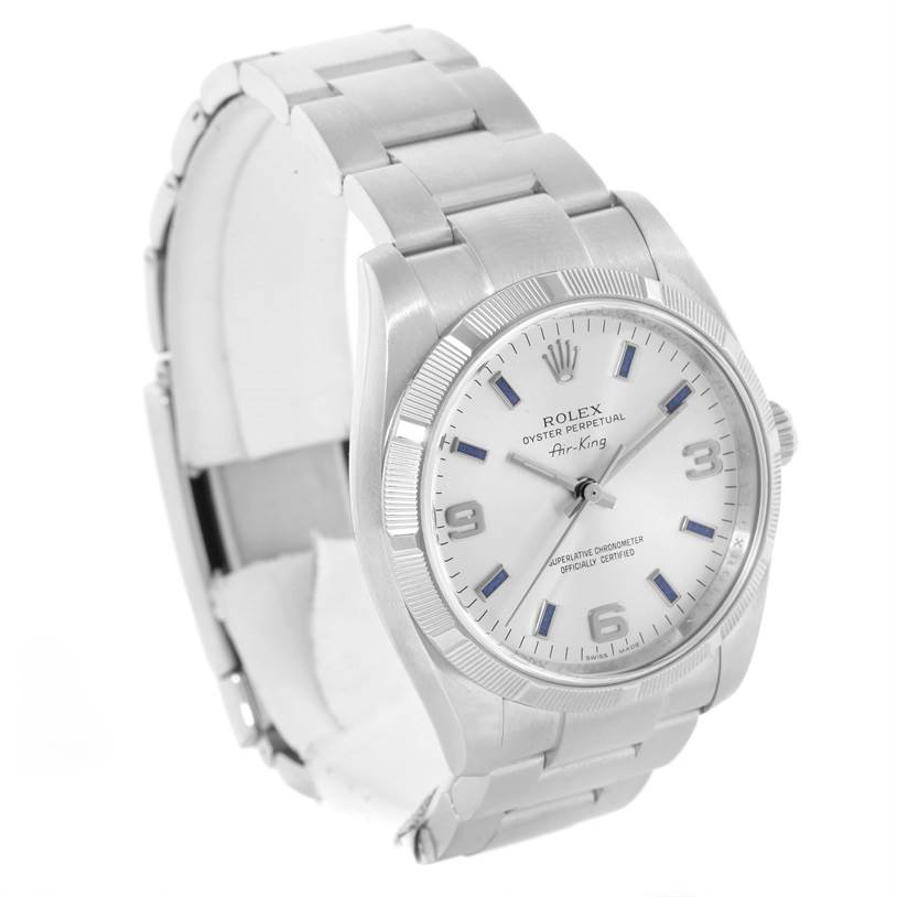 The Rolex Air-King 114210 Men's Stainless Steel Silver Dial 114210 Men's Stainless Steel Silver Dial watch is shown at an angled view, displaying the face, bezel, and part of the bracelet.