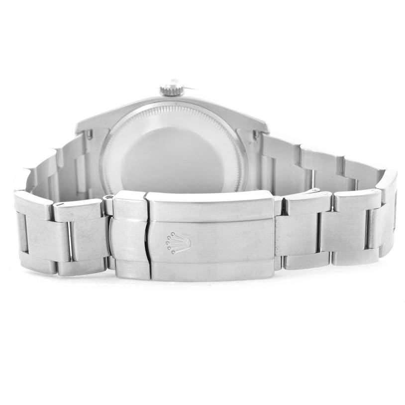 This is a rear view of the Rolex Air-King 114200BLRO Men's Stainless Steel Blue Dial 114200BLRO Men's Stainless Steel Blue Dial watch, showcasing its clasp and bracelet.