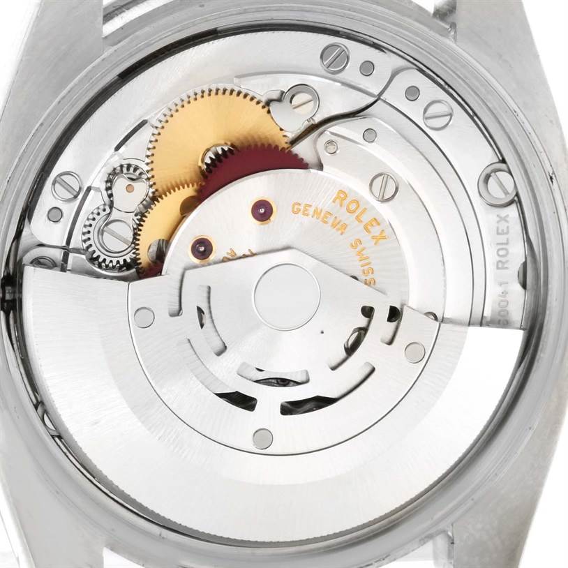 The image shows the internal mechanical movement of a Rolex Air-King 114200BLRO Men's Stainless Steel Blue Dial 114200BLRO Men's Stainless Steel Blue Dial watch from the back.