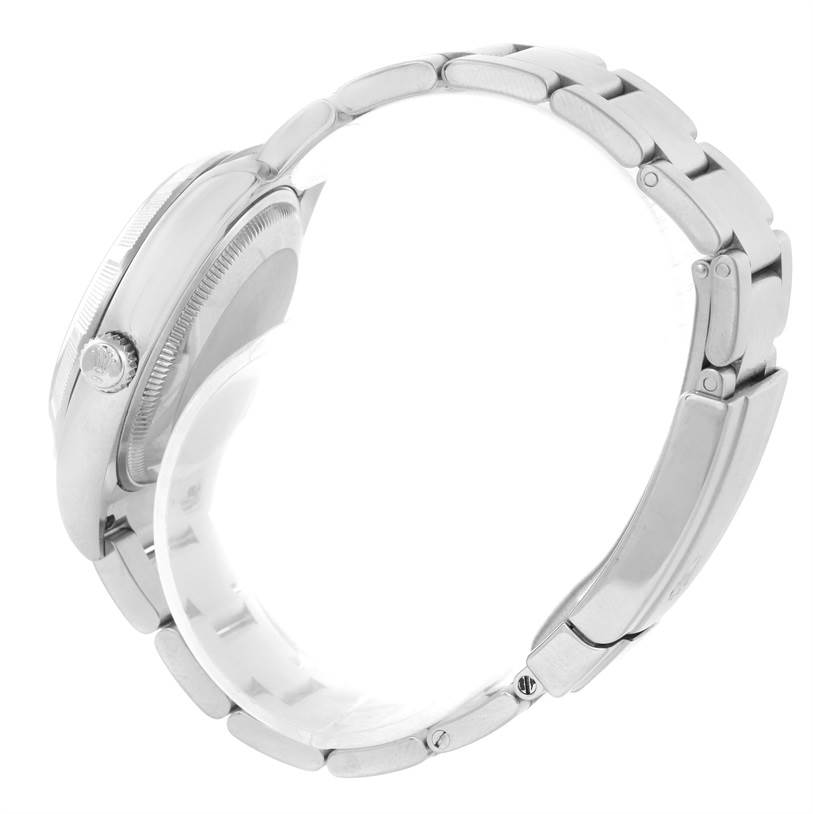 The image shows a side view of the Rolex Air-King 114200BLRO Men's Stainless Steel Blue Dial 114200BLRO Men's Stainless Steel Blue Dial watch, highlighting its stainless steel case and bracelet with the crown visible.