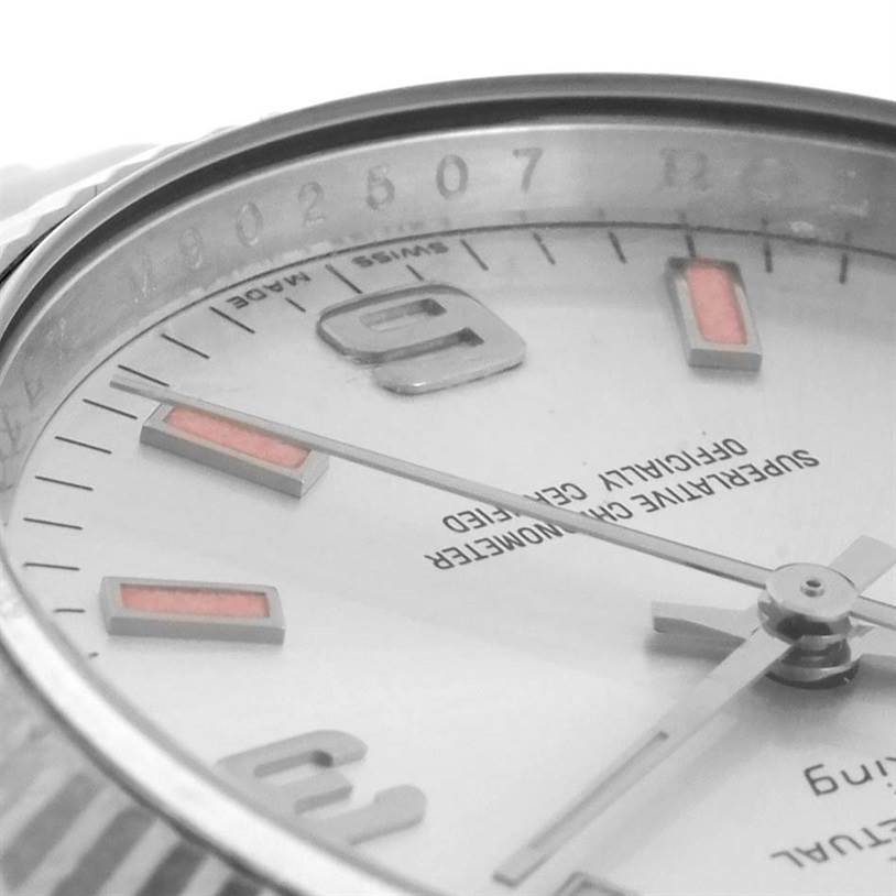 The image shows a close-up angle of the Rolex Air-King 114234SAPSO Men's Stainless Steel Silver Dial 114234SAPSO Men's Stainless Steel Silver Dial watch, highlighting its dial, hands, and part of the bezel.