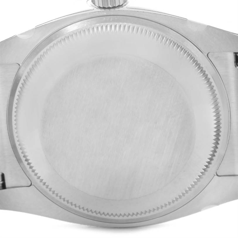 This image shows the case back of a Rolex Air-King 114200BLASO Men's Stainless Steel Blue Dial 114200BLASO Men's Stainless Steel Blue Dial watch, viewed from a close-up angle.