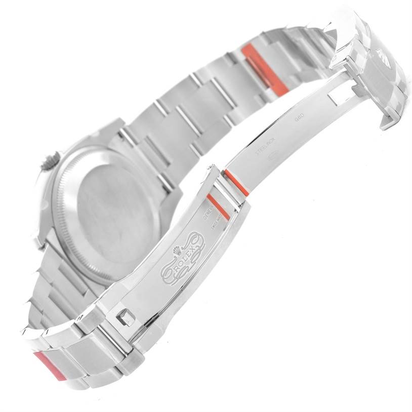 The image shows the open stainless steel bracelet and clasp of a Rolex Air-King 114200BLASO Men's Stainless Steel Blue Dial 114200BLASO Men's Stainless Steel Blue Dial watch from a side angle.