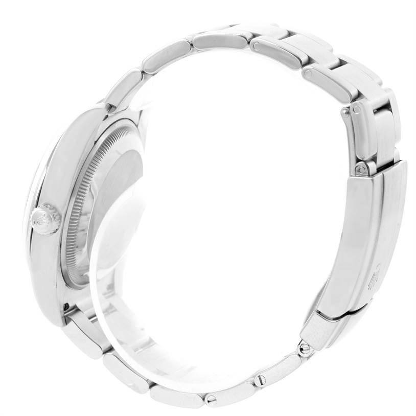 The image shows a side view of a Rolex Air-King 114200 Stainless Steel White Dial 114200 Stainless Steel White Dial watch, highlighting the crown, case, and bracelet links.